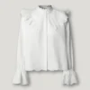 Blusa com folhos fluidos Blusa com folhos fluidos