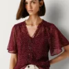 Blusa de chiffon com padrão de bolinhas Blusa de chiffon com padrão de bolinhas