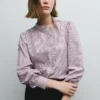 Blusa de popelina com folhos