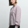 Blusa de popelina com folhos