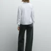 Blusa de popelina com folhos