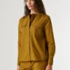 Blusa fluida com bolsos Blusa fluida com bolsos