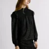 Blusa fluida com detalhes metálicos Blusa fluida com detalhes metálicos