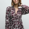 Blusa fluida com estampado floral Blusa fluida com estampado floral