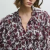 Blusa fluida com estampado floral Blusa fluida com estampado floral