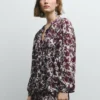 Blusa fluida com estampado floral Blusa fluida com estampado floral
