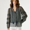 Blusa semitransparente com folhos