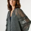 Blusa semitransparente com folhos