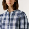 Blusa xadrez com folhos