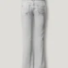 Calças de ganga de cintura média e corte bootcut – Piper Calças de ganga de cintura média e corte bootcut – Piper