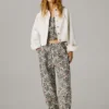 Calças de perna larga com estampado floral Calças de perna larga com estampado floral