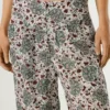 Calças de perna larga com estampado floral Calças de perna larga com estampado floral
