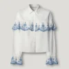 Camisa com folhos bordados