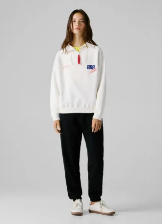 Camisola com meio fecho e corte descontraído