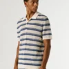 Polo de malha às riscas Polo de malha às riscas