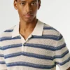 Polo de malha às riscas Polo de malha às riscas