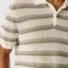 Polo de malha às riscas Polo de malha às riscas