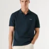 Polo em piqué tingida na peça Polo em piqué tingida na peça