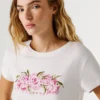 T-shirt com logótipo floral estampado