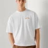 T-shirt de corte largo com estampado nas costas T-shirt de corte largo com estampado nas costas