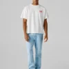 T-shirt de corte largo com estampado nas costas T-shirt de corte largo com estampado nas costas