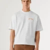T-shirt de corte largo com estampado nas costas T-shirt de corte largo com estampado nas costas