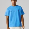 T-shirt de corte largo com estampado nas costas T-shirt de corte largo com estampado nas costas