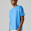 T-shirt de corte largo com estampado nas costas T-shirt de corte largo com estampado nas costas