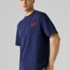 T-shirt de corte largo com estampado nas costas T-shirt de corte largo com estampado nas costas