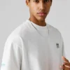 T-shirt de corte largo com estampado nas costas T-shirt de corte largo com estampado nas costas