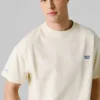 T-shirt de corte largo com estampado nas costas T-shirt de corte largo com estampado nas costas
