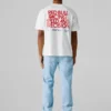 T-shirt de corte largo com estampado nas costas T-shirt de corte largo com estampado nas costas