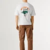 T-shirt de corte largo com estampado nas costas T-shirt de corte largo com estampado nas costas