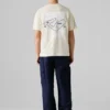 T-shirt de corte largo com estampado nas costas T-shirt de corte largo com estampado nas costas