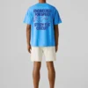 T-shirt de corte largo com estampado nas costas T-shirt de corte largo com estampado nas costas