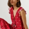 Top com decote em V e estampado floral Top com decote em V e estampado floral