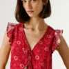 Top com decote em V e estampado floral Top com decote em V e estampado floral
