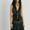 Top com detalhes bordados Top com detalhes bordados