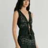 Top com detalhes bordados Top com detalhes bordados