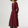 Vestido midi às bolinhas Vestido midi às bolinhas